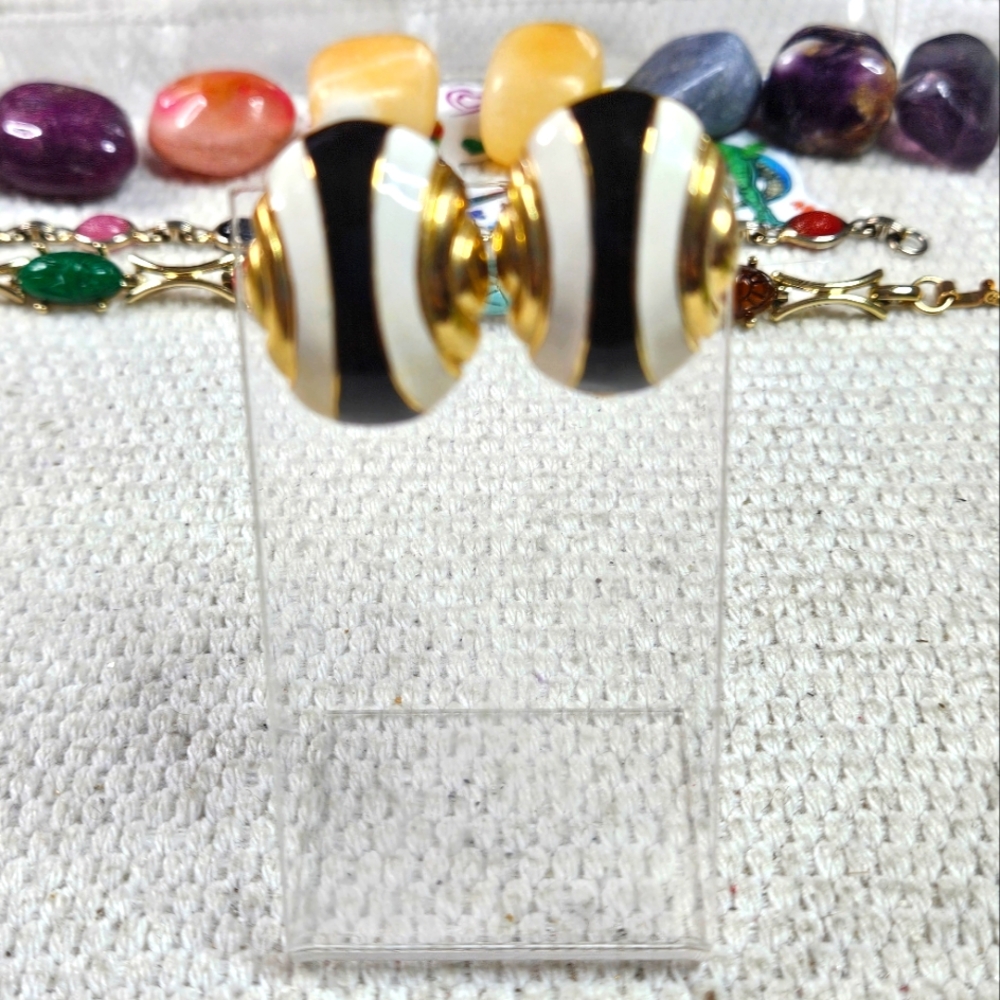 Enamel gold tone clip earrings
